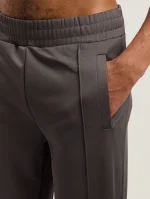 curved-logo-track-pants-4